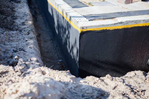 Professional Interior Drainage System technician working in Titusville, NJ